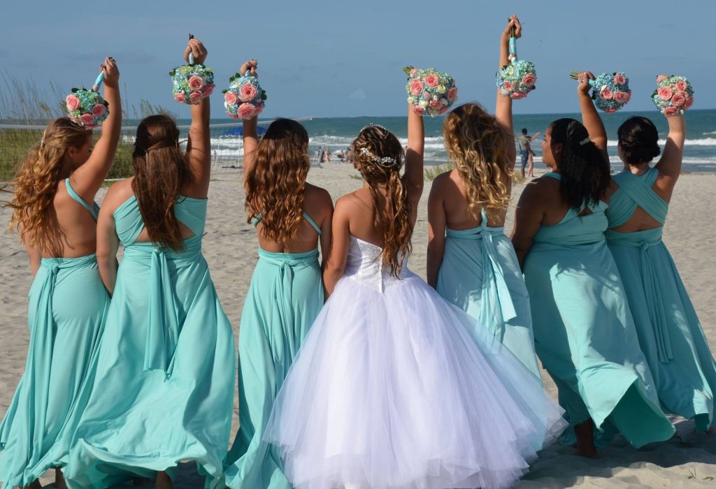 Photo of a bride and her wedding party